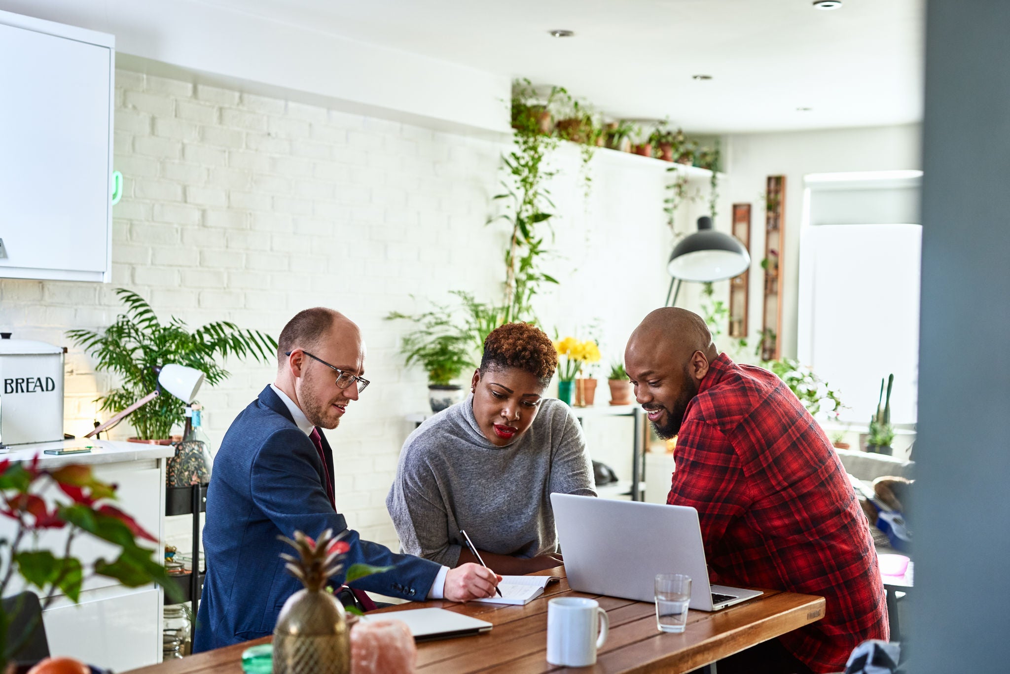 Informal meeting with mortgage advisor, discussion, paperwork, agreement