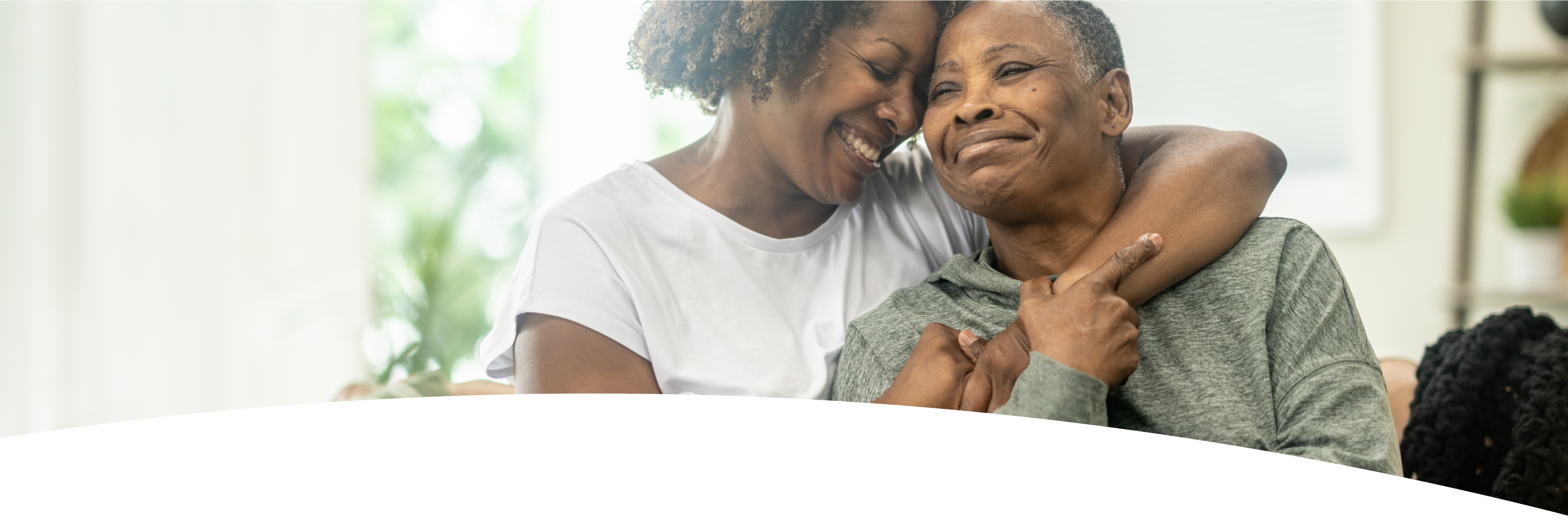 Woman hugging mother