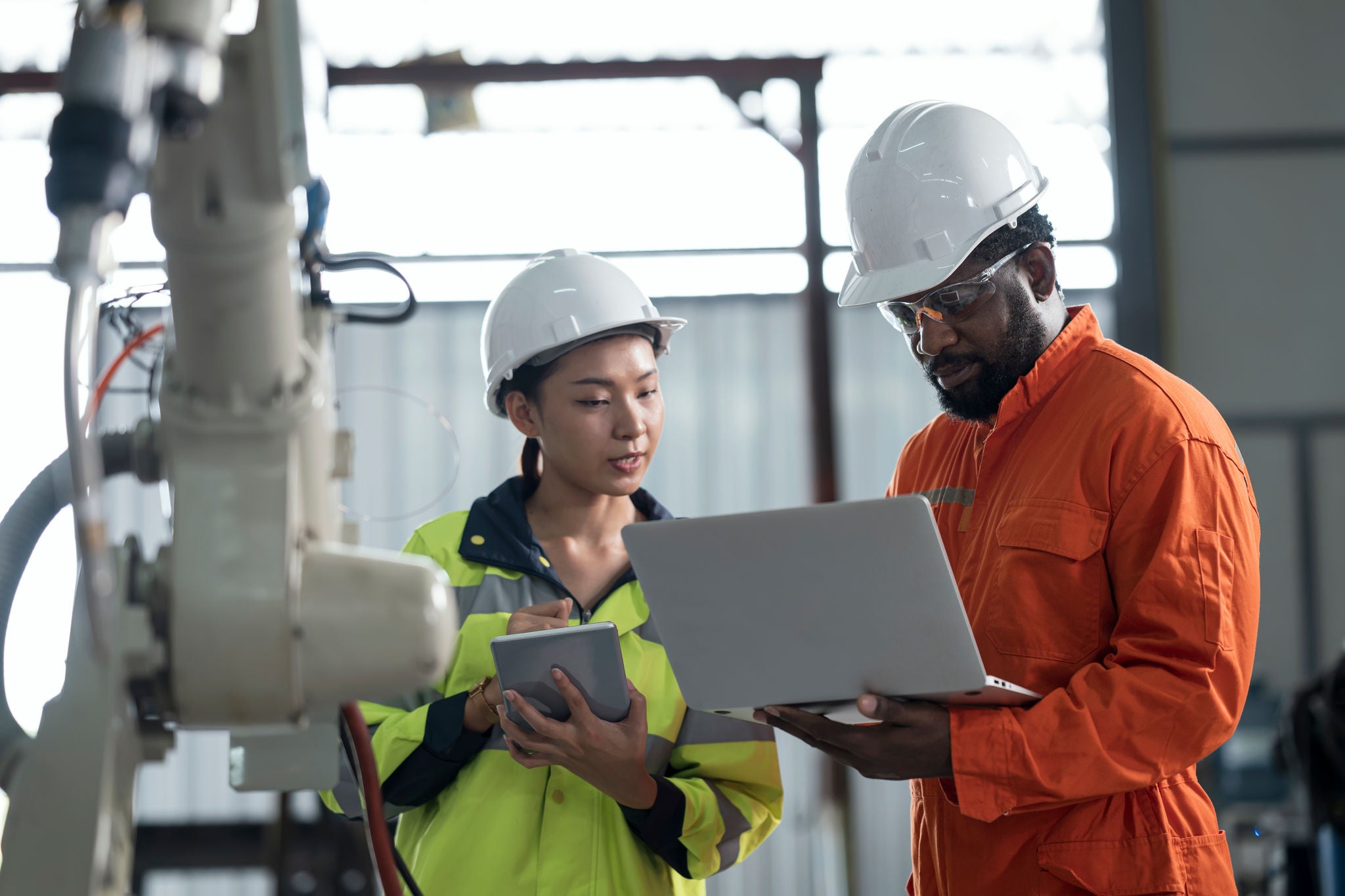 Workers reviewing results